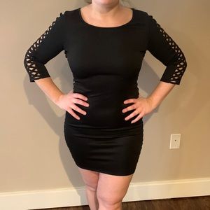 Black cut out mini dress with sleeves NWT